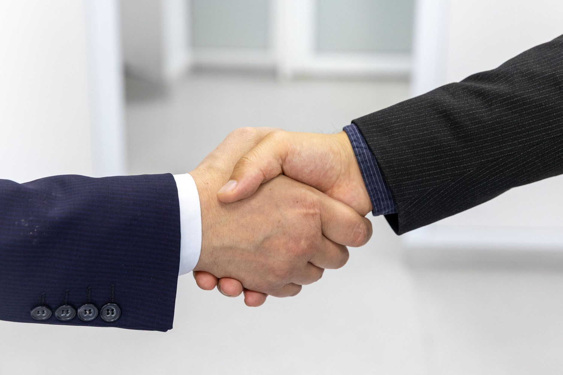 Corporate acquisition contract signatures and closing